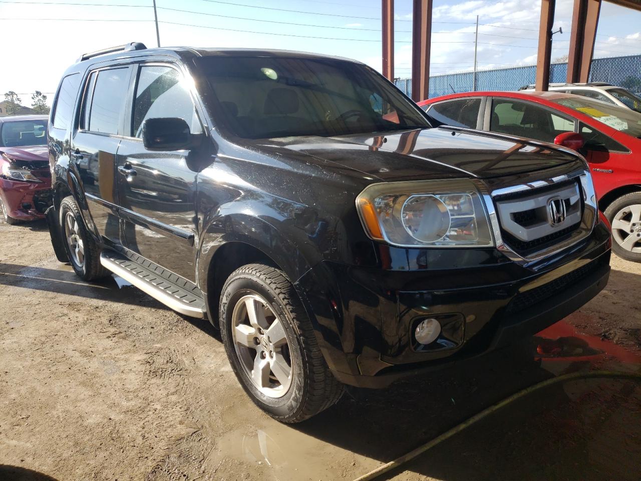 HONDA PILOT EXL 2010 with VIN 5FNYF3H57AB008571 - Photo from auction