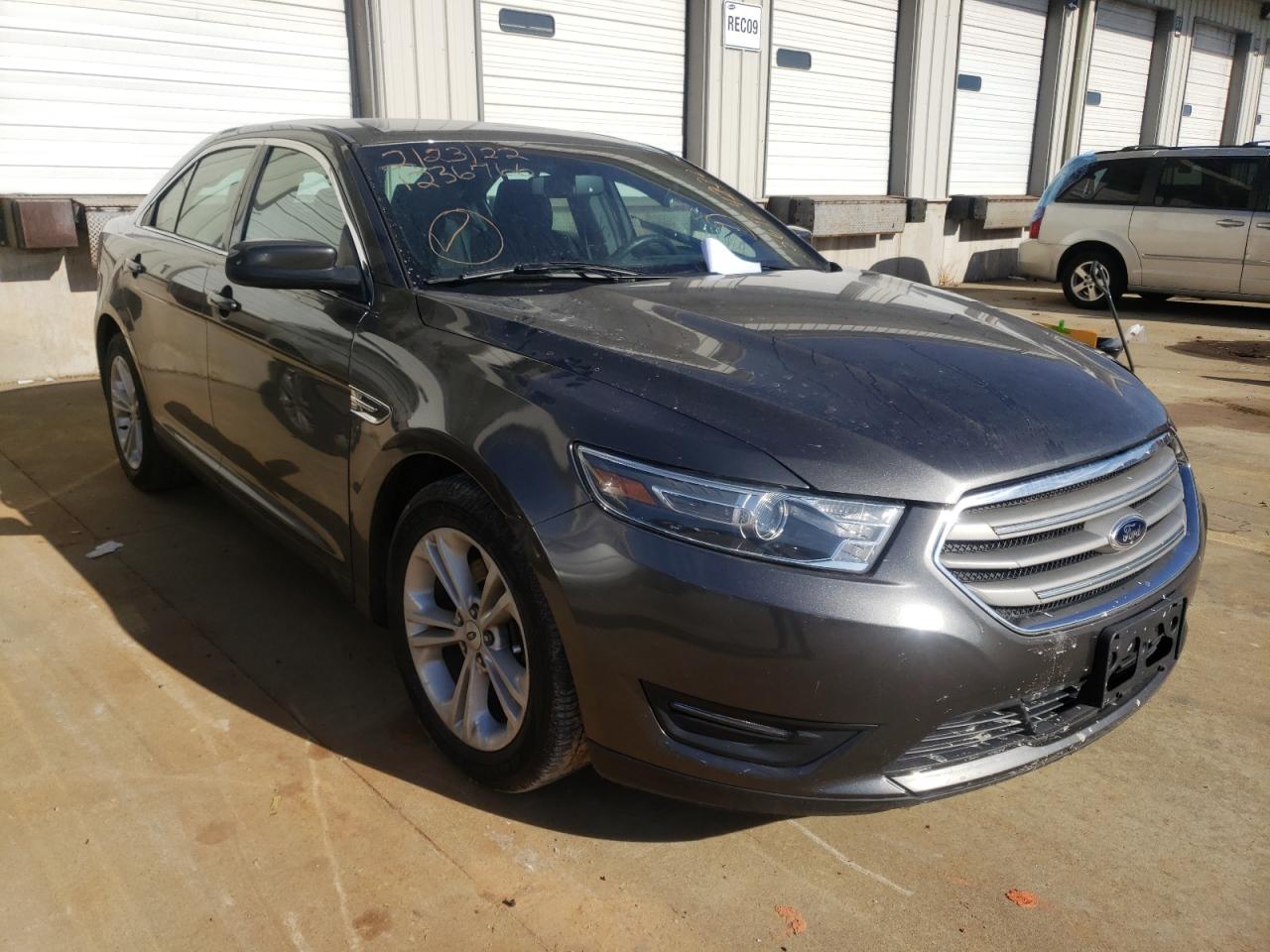 FORD TAURUS SEL 2015 with VIN 1FAHP2E80FG127328 - Photo from auction