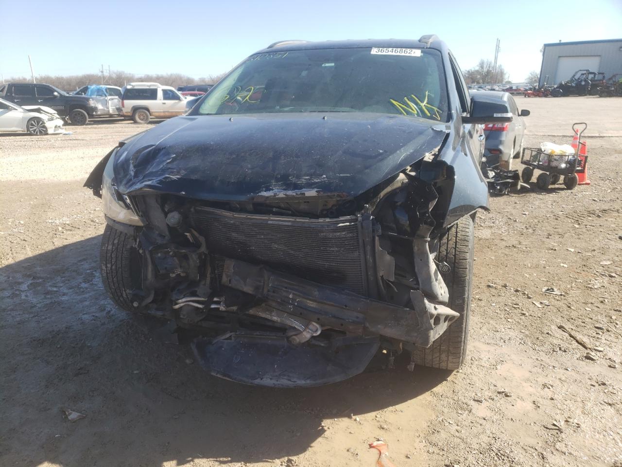 Photo 9 from auction – 2014 CHEVROLET TRAVERSE L with VIN 1GNKRGKDXEJ310351