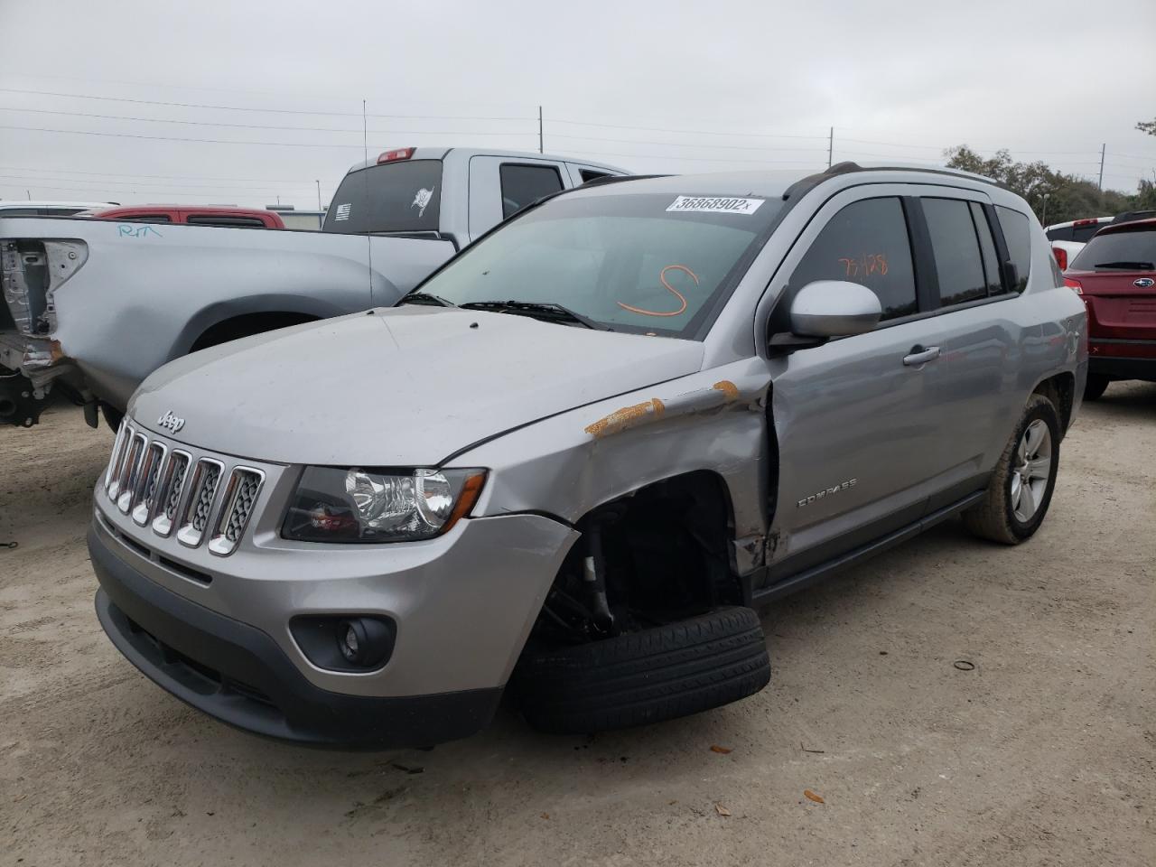 Photo 2 from auction – 2014 JEEP COMPASS LA with VIN 1C4NJDEBXED858886