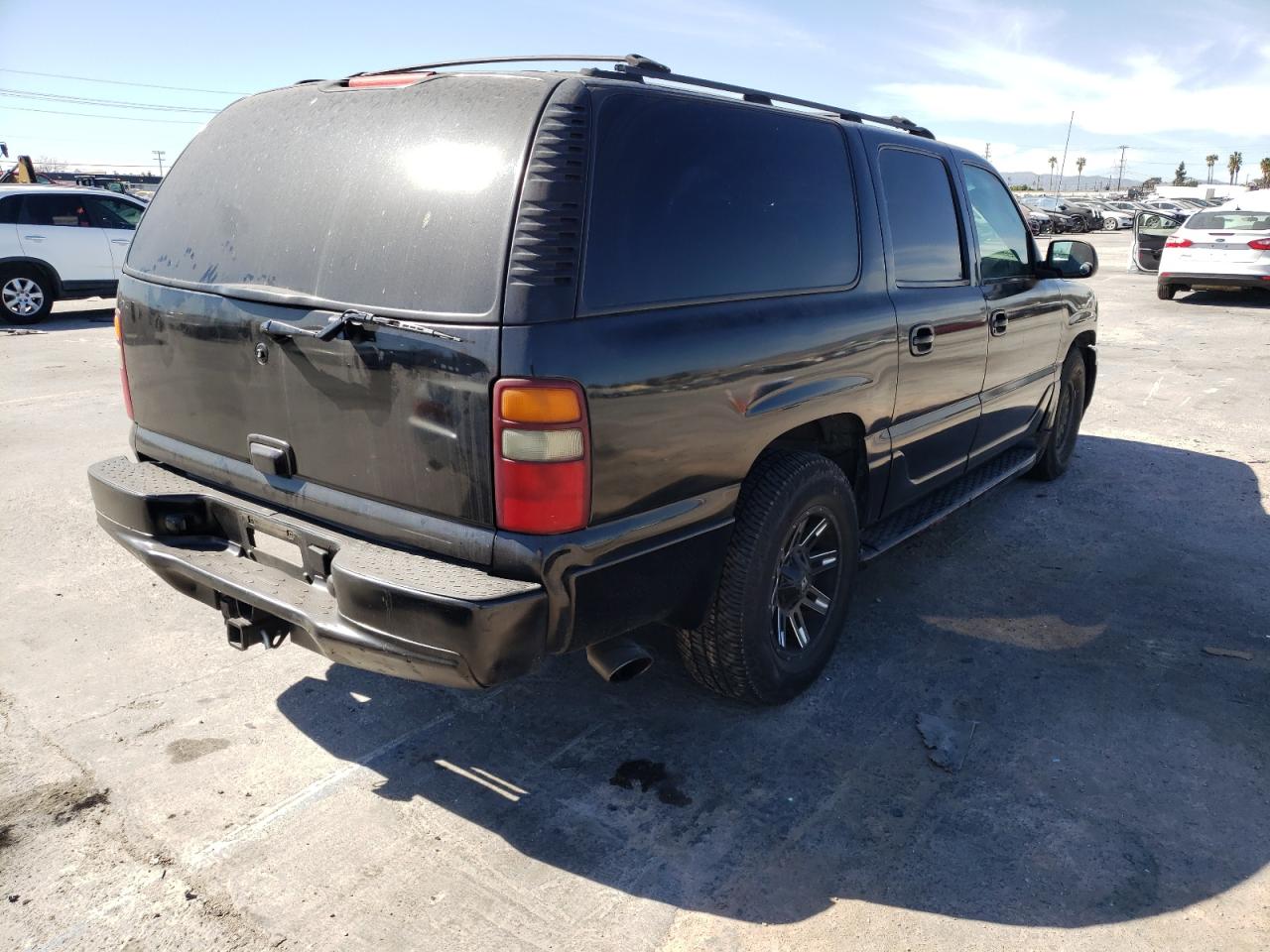 Photo 4 from auction – 2002 GMC YUKON with VIN 1GKFK66U92J233023