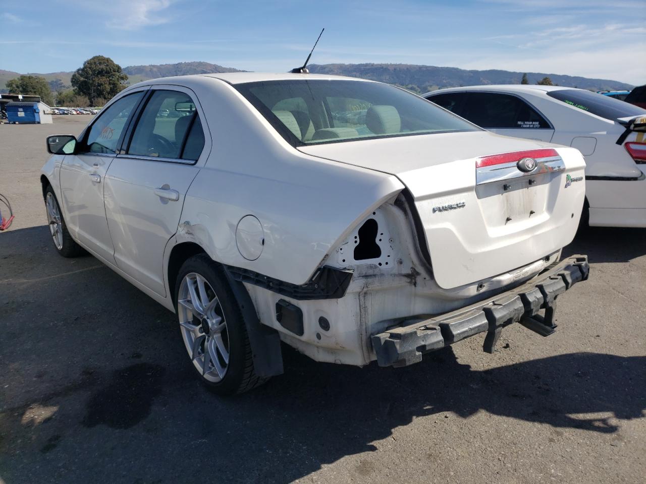 Photo 3 from auction – 2011 FORD FUSION HYB with VIN 3FADP0L36BR110384
