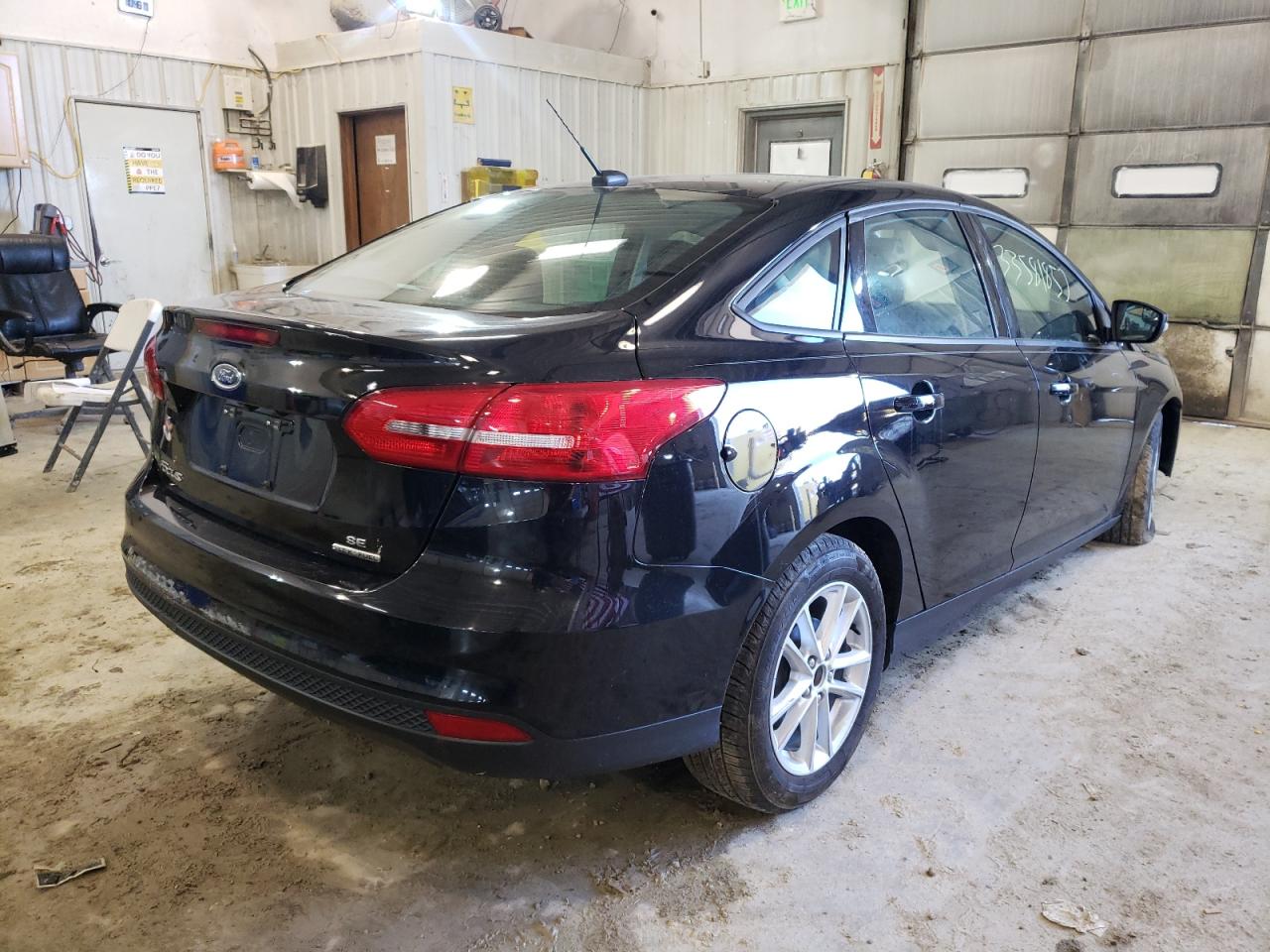 Photo 4 from auction – 2016 FORD FOCUS SE with VIN 1FADP3F23GL310150