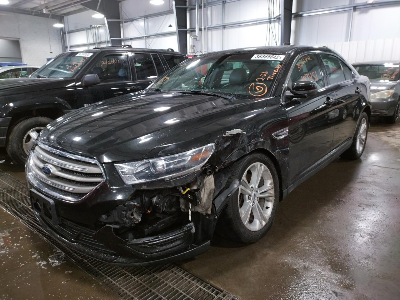 Photo 2 from auction – 2015 FORD TAURUS SEL with VIN 1FAHP2E88FG140716