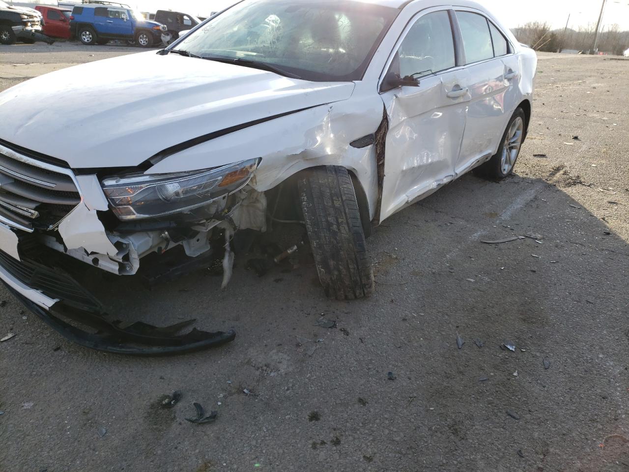 Photo 9 from auction – 2013 FORD TAURUS SEL with VIN 1FAHP2E87DG192500