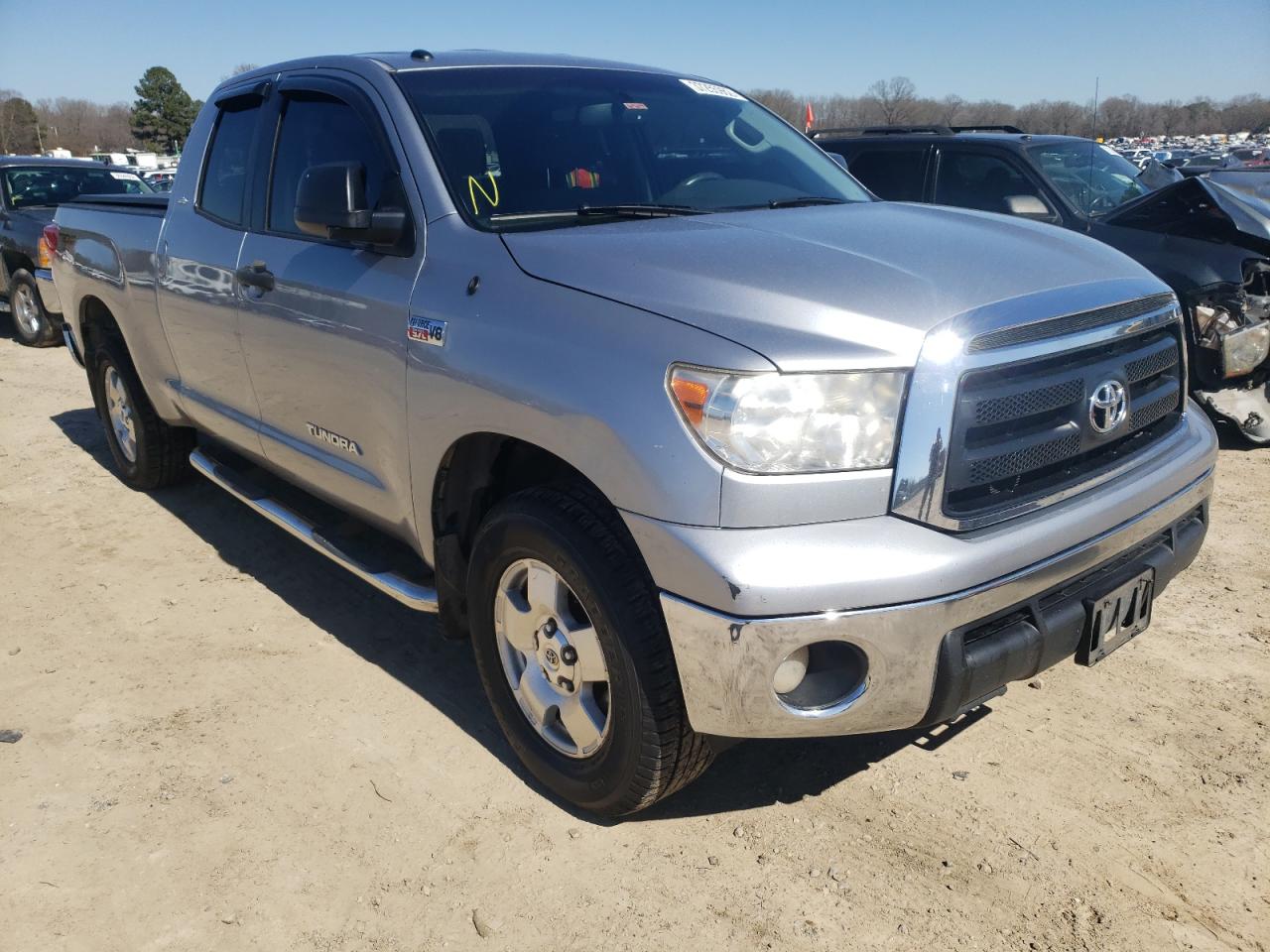 TOYOTA TUNDRA DOU 2012 with VIN 5TFUY5F19CX215931 - Photo from auction