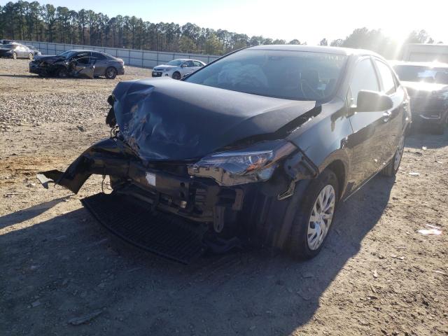 Photo 2 from auction – 2017 TOYOTA COROLLA L with VIN 5YFBURHE2HP684455