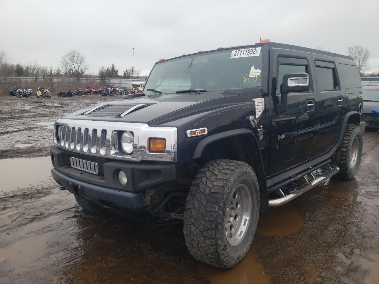 Photo 2 from auction – 2004 HUMMER H2 with VIN 5GRGN23U14H112743