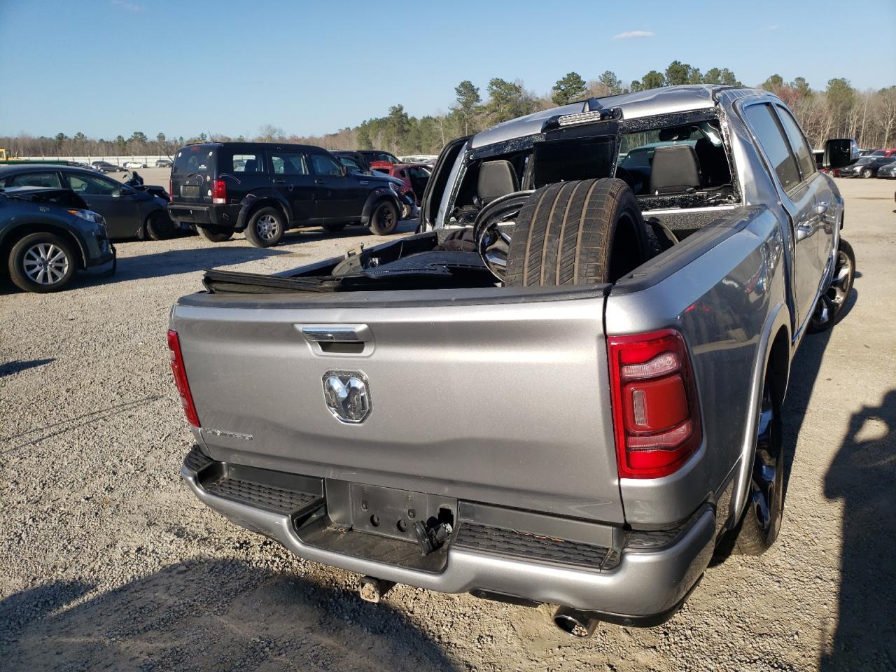 Photo 4 from auction – 2021 RAM 1500 LIMIT with VIN 1C6RREHT3MN575413