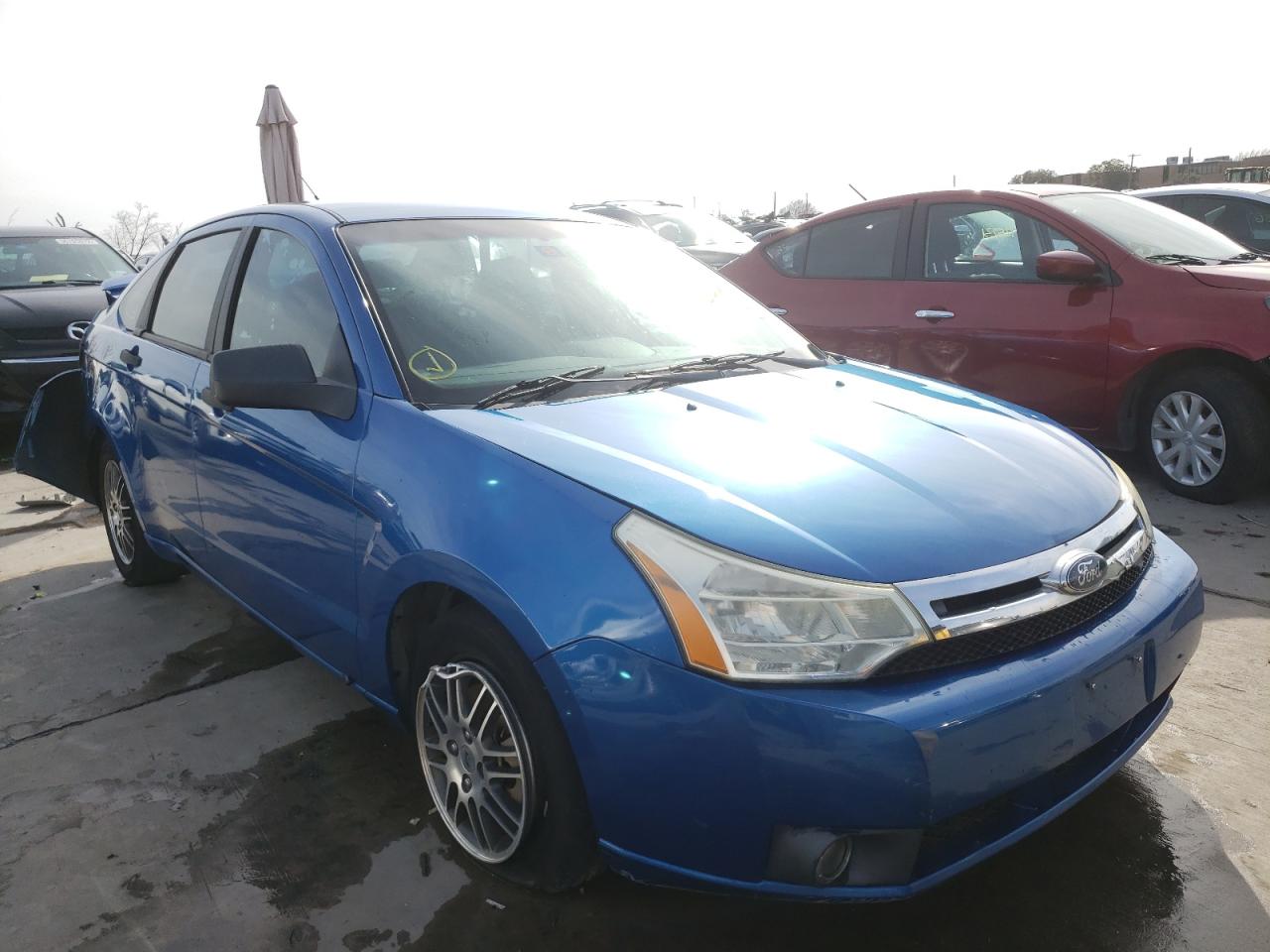 FORD FOCUS SE 2010 with VIN 1FAHP3FN1AW156877 - Photo from auction
