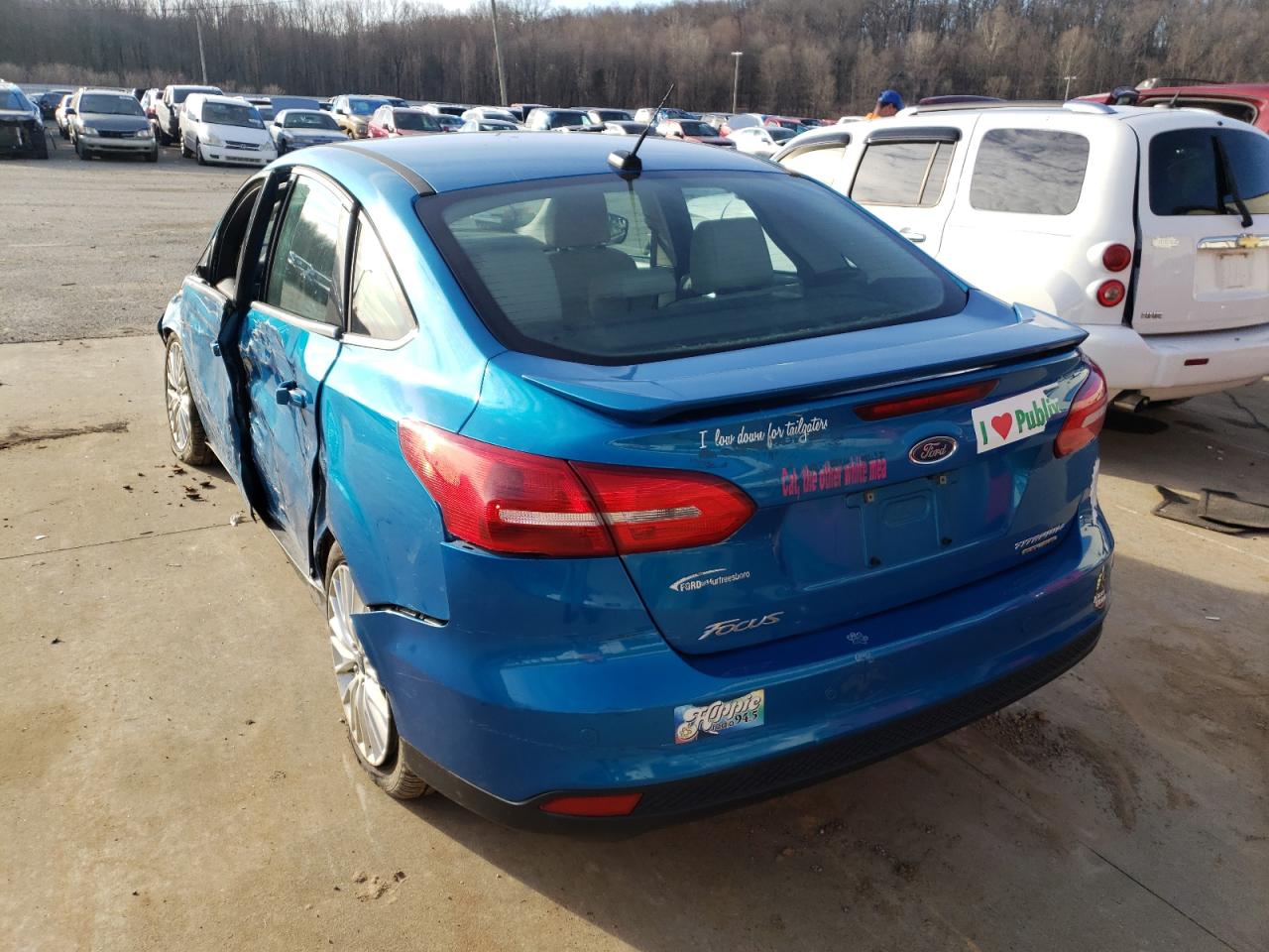 Photo 3 from auction – 2015 FORD FOCUS TITA with VIN 1FADP3J20FL209105