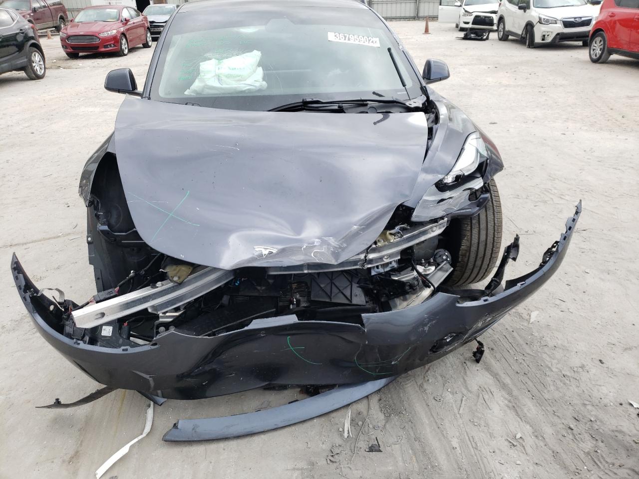 Photo 10 from auction – 2021 TESLA MODEL 3 with VIN 5YJ3E1EAXMF014579