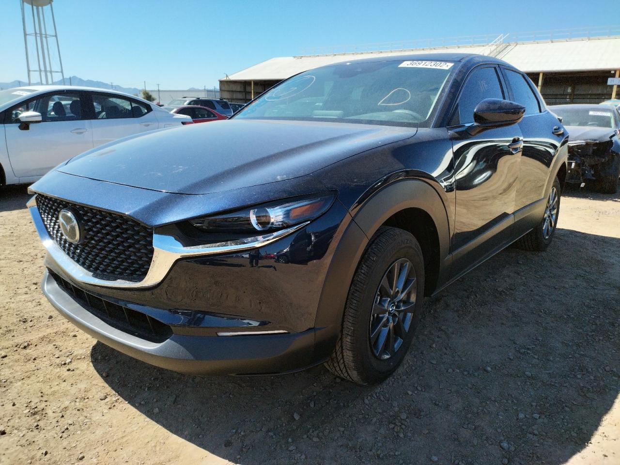 Photo 2 from auction – 2021 MAZDA CX-30 with VIN 3MVDMAAL0MM252577