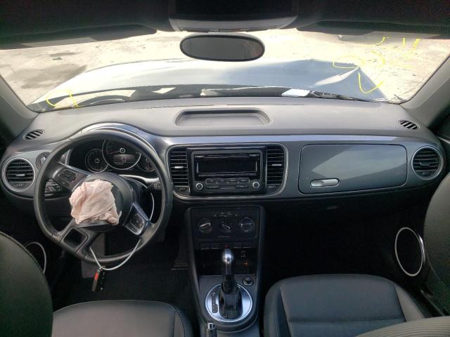 Photo 9 from auction – 2014 VOLKSWAGEN BEETLE with VIN 3VWJP7AT1EM608967