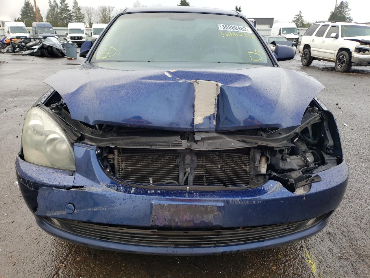 Photo 9 from auction – 2006 KIA OPTIMA LX with VIN KNAGE124X65064626