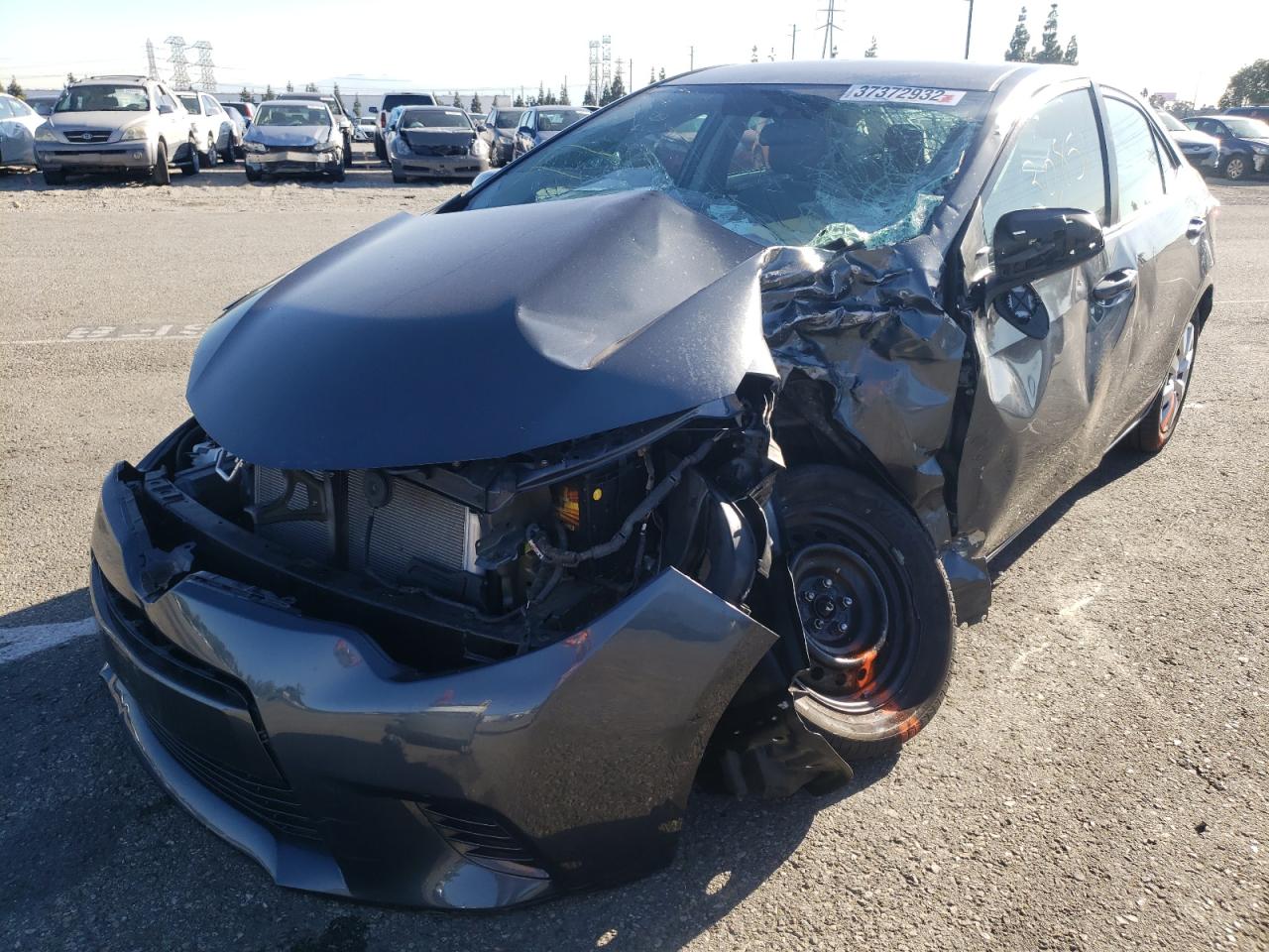 Photo 2 from auction – 2015 TOYOTA COROLLA L with VIN 5YFBURHE8FP339458