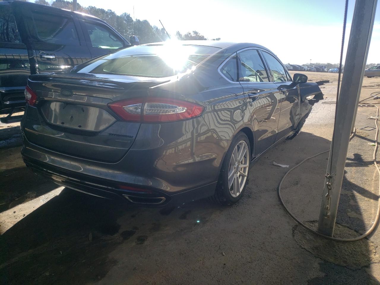 Photo 4 from auction – 2016 FORD FUSION TIT with VIN 3FA6P0K97GR296460