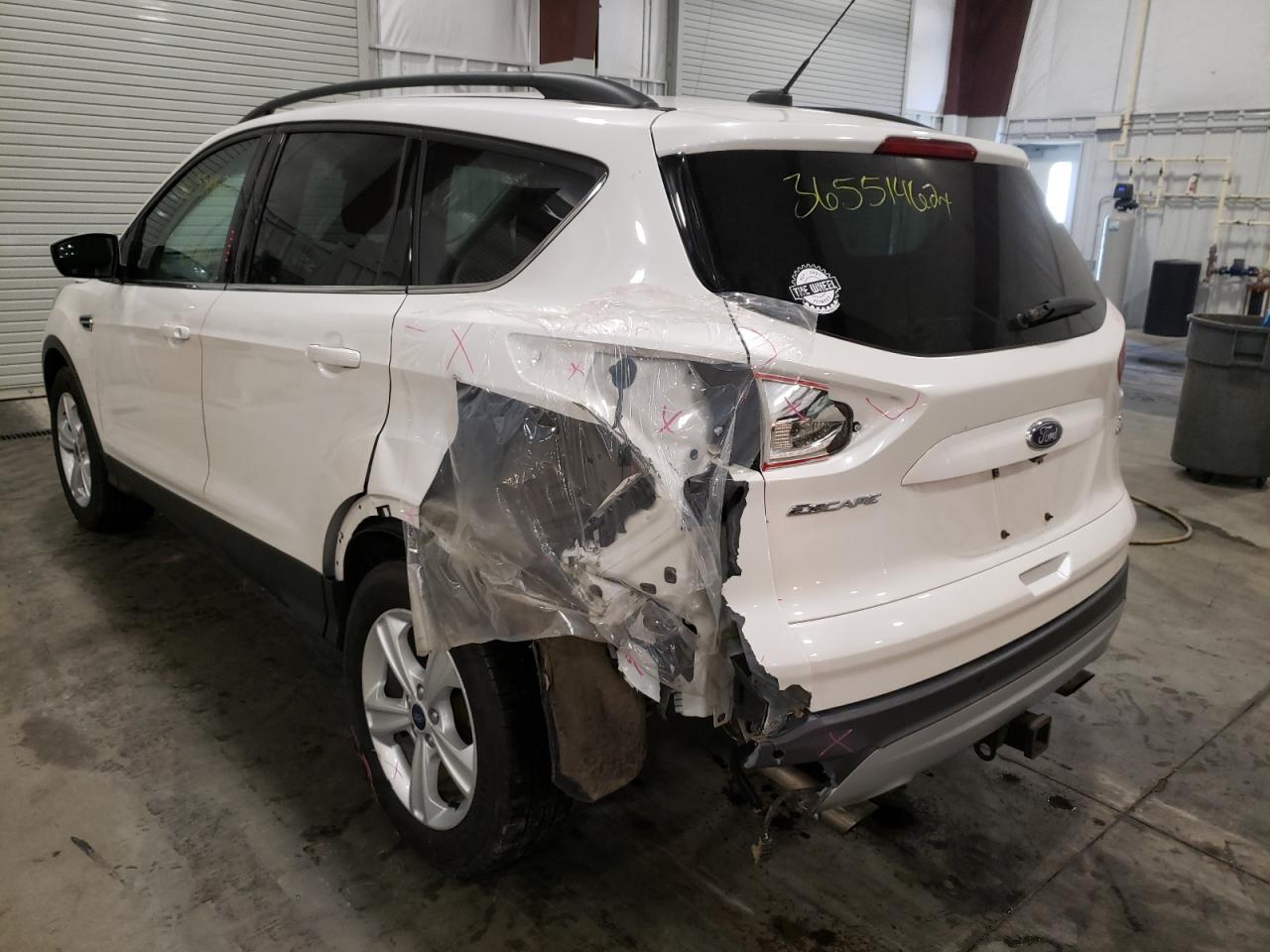 Photo 3 from auction – 2016 FORD ESCAPE SE with VIN 1FMCU9G98GUA53361