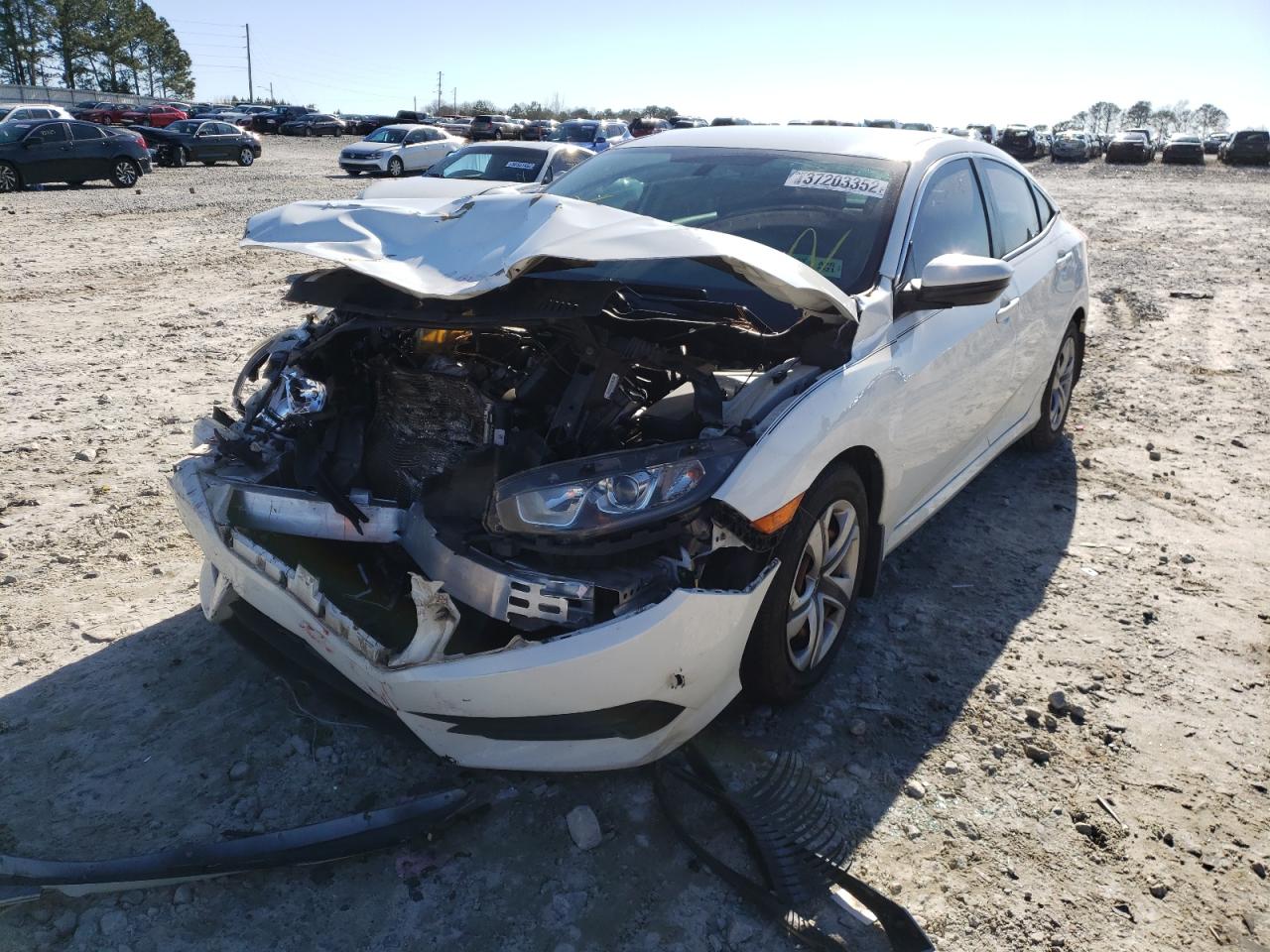 Photo 2 from auction – 2016 HONDA CIVIC LX with VIN 19XFC2F58GE028064