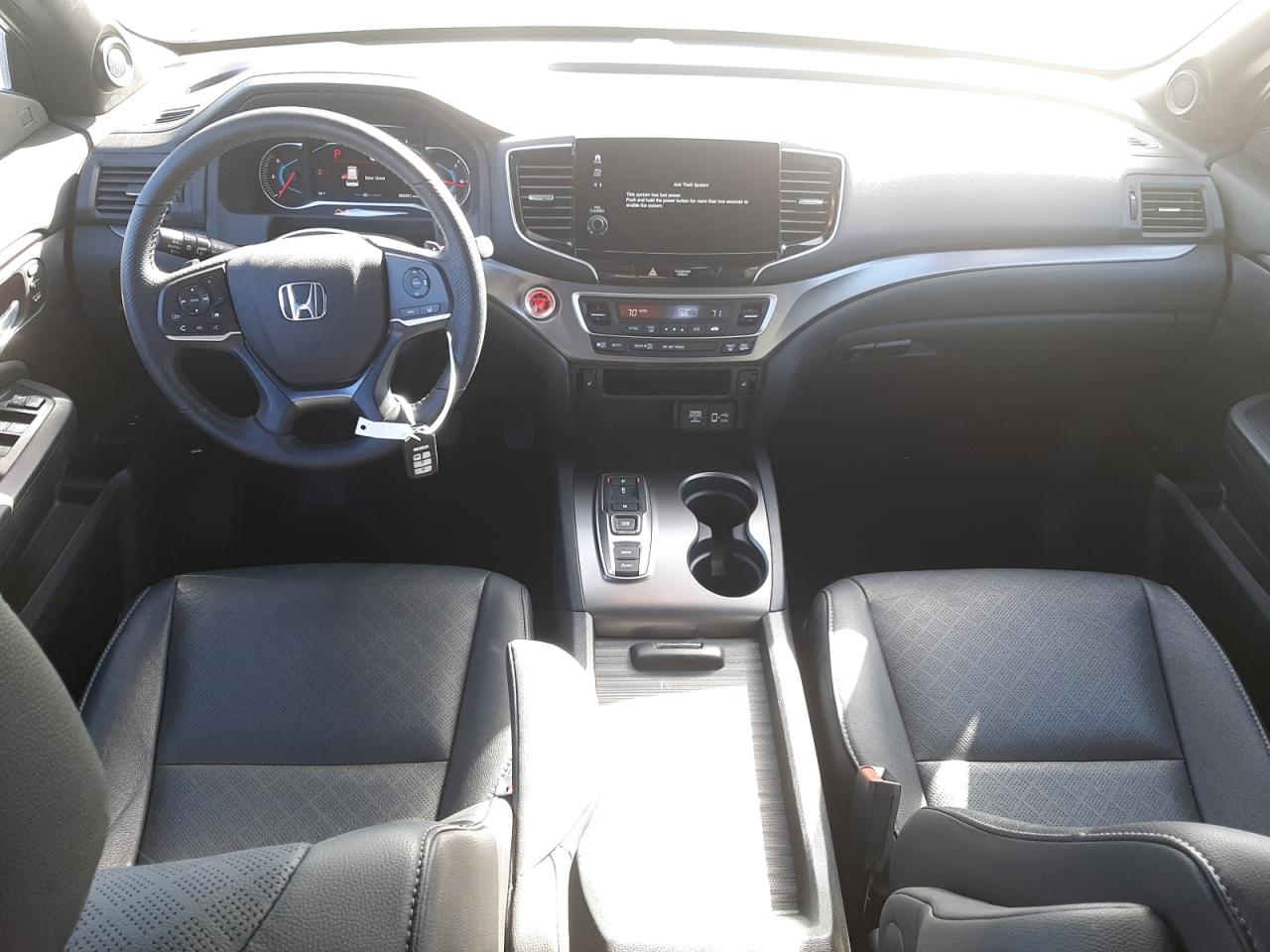 Photo 9 from auction – 2020 HONDA PASSPORT E with VIN 5FNYF7H54LB003984