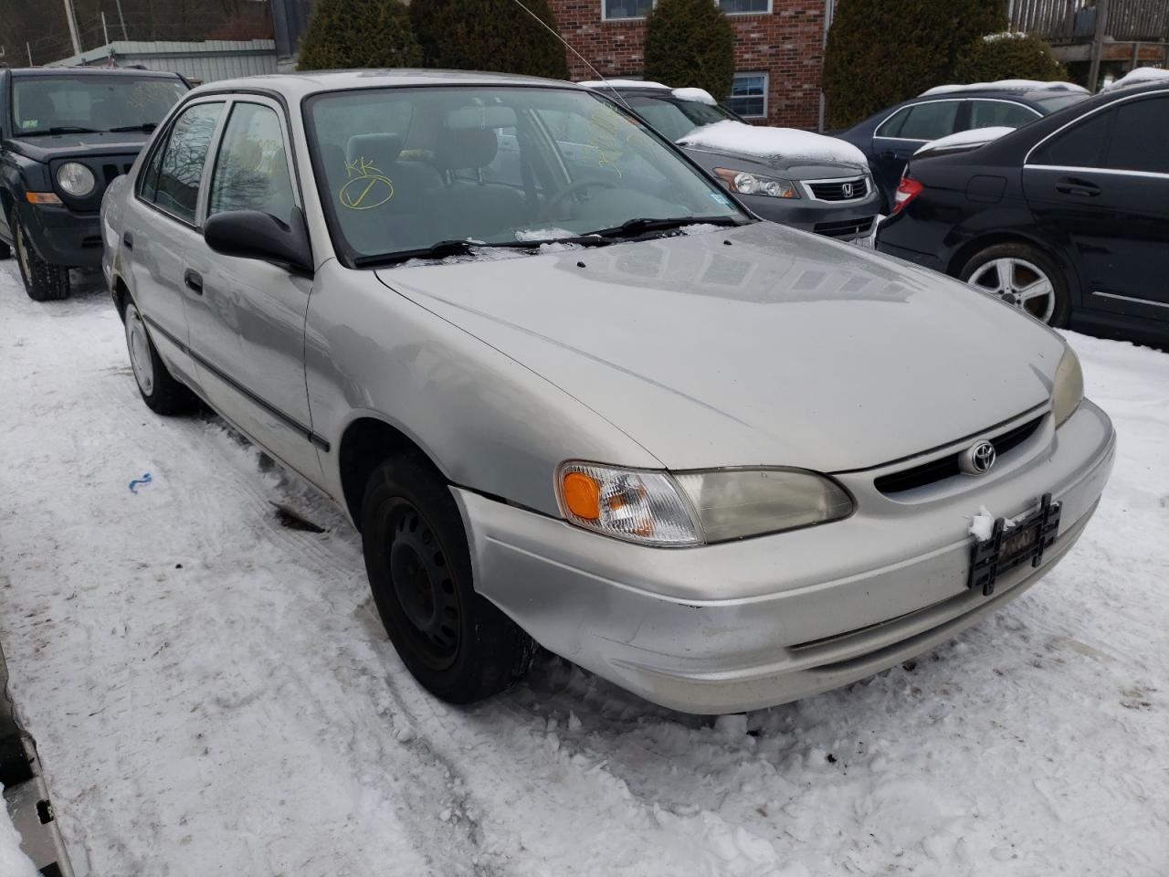 TOYOTA COROLLA 1999 with VIN 2T1BR12E4XC162856 - Photo from auction