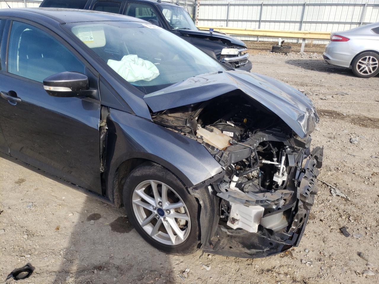 Photo 9 from auction – 2017 FORD FOCUS SE with VIN 1FADP3F21HL201705