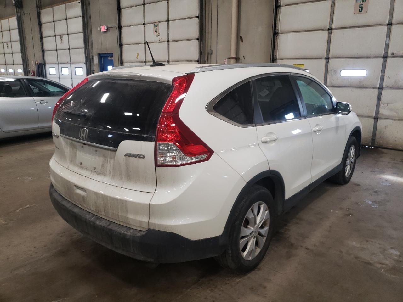 Photo 4 from auction – 2013 HONDA CRV with VIN 5J6RM4H70DL046799