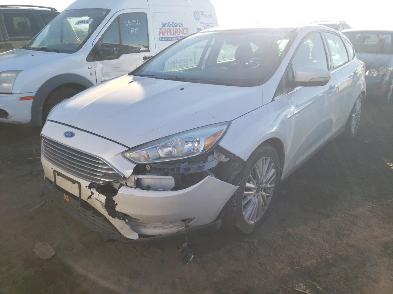 Photo 2 from auction – 2015 FORD FOCUS TITA with VIN 1FADP3N23FL255764