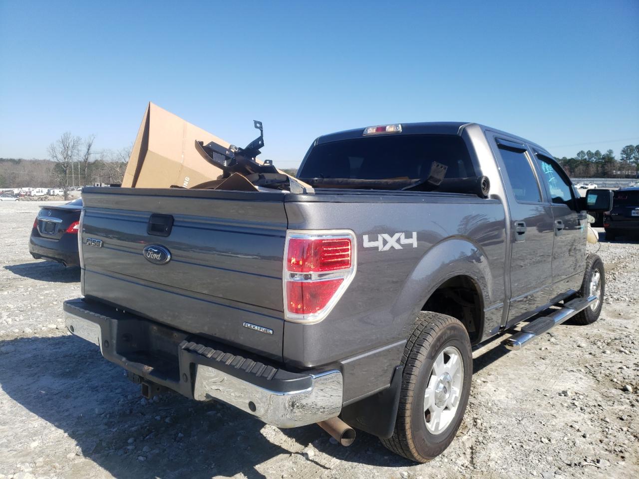Photo 4 from auction – 2014 FORD F150 SUPER with VIN 1FTFW1EF4EFA77809