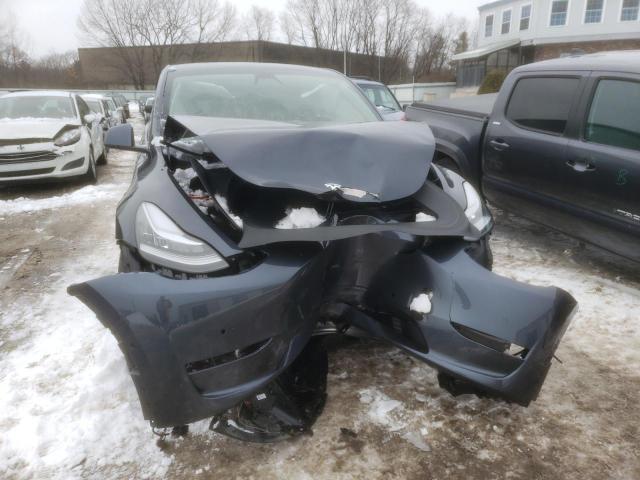 Photo 9 from auction – 2021 TESLA MODEL Y with VIN 5YJYGDEE0MF297501
