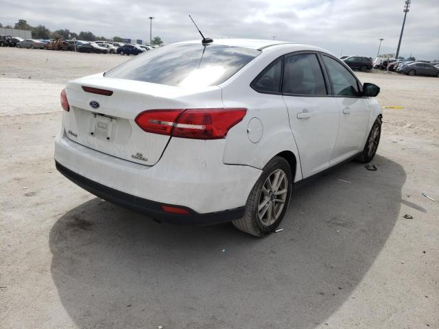 Photo 4 from auction – 2016 FORD FOCUS SE with VIN 1FADP3F20GL236539