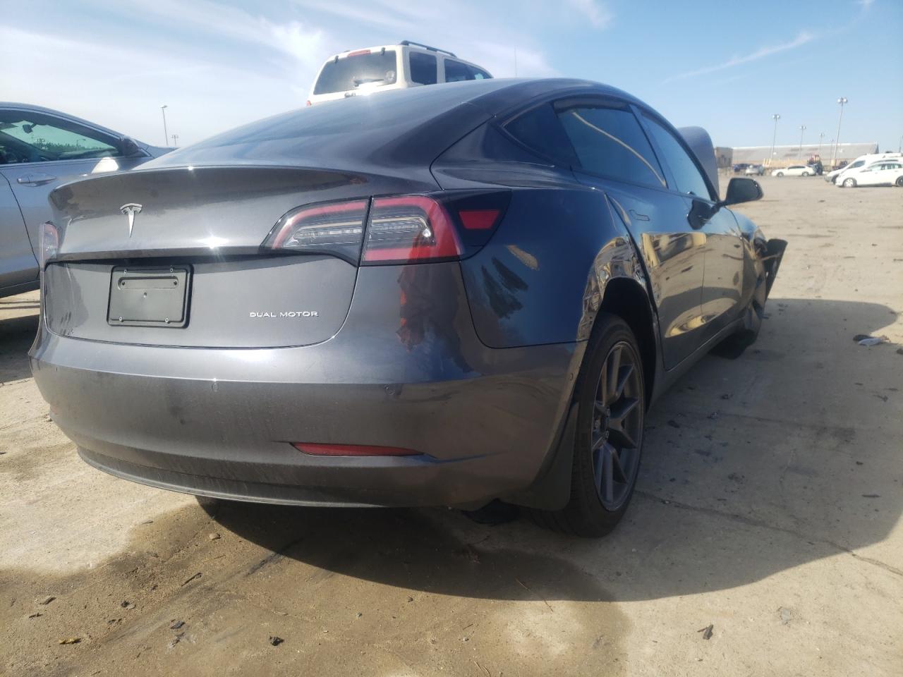 Photo 4 from auction – 2021 TESLA MODEL 3 with VIN 5YJ3E1EB1MF979615