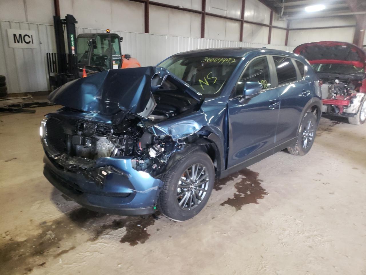 Photo 2 from auction – 2021 MAZDA CX-5 TOURI with VIN JM3KFBCM4M1494968