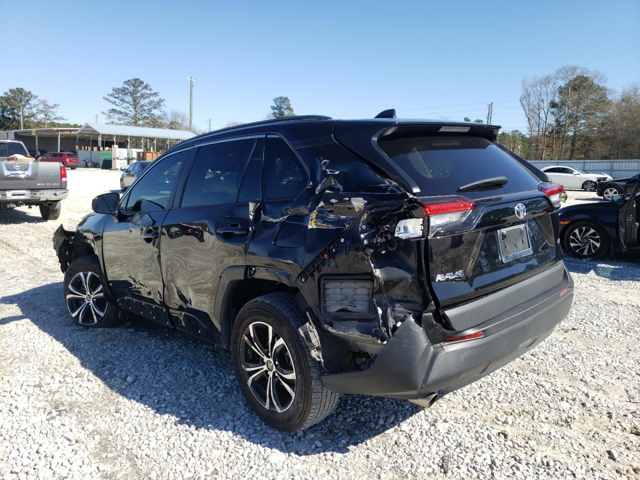 Photo 3 from auction – 2021 TOYOTA RAV4 LE with VIN 2T3H1RFV2MC121073