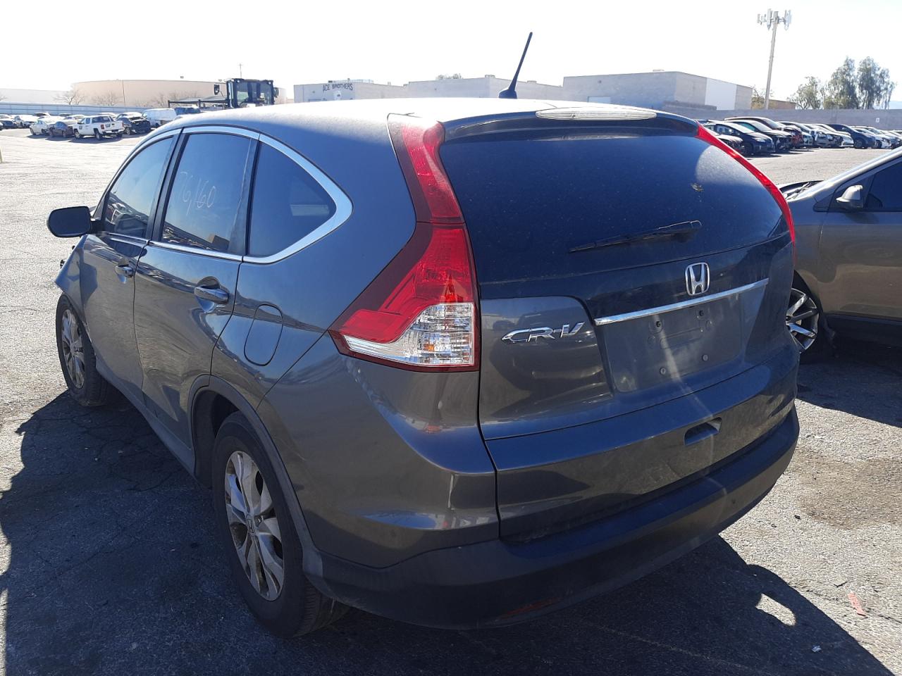 Photo 3 from auction – 2014 HONDA CR-V EX with VIN 2HKRM3H54EH509922