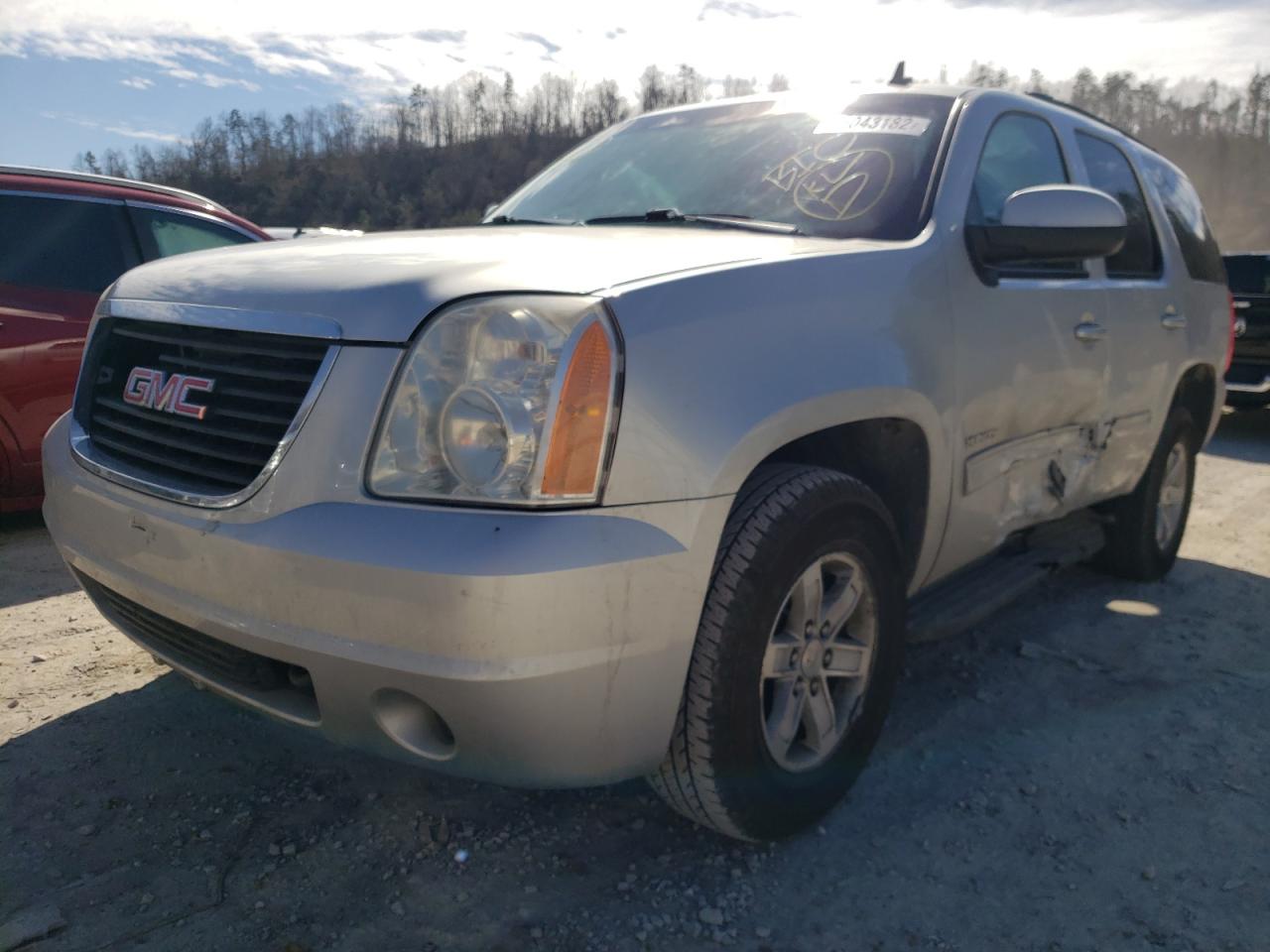 Photo 2 from auction – 2011 GMC YUKON SLE with VIN 1GKS2AE00BR107358