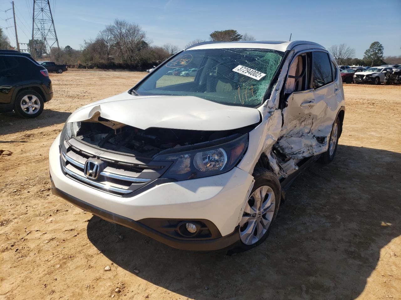 Photo 2 from auction – 2012 HONDA CR-V EXL with VIN 5J6RM3H76CL043205