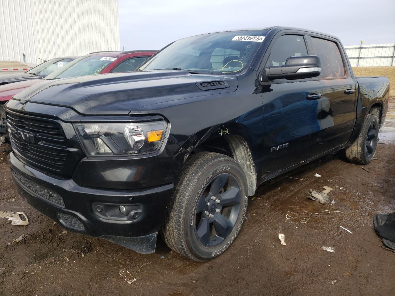 Photo 2 from auction – 2019 RAM 1500 BIG H with VIN 1C6RRFFG2KN909293