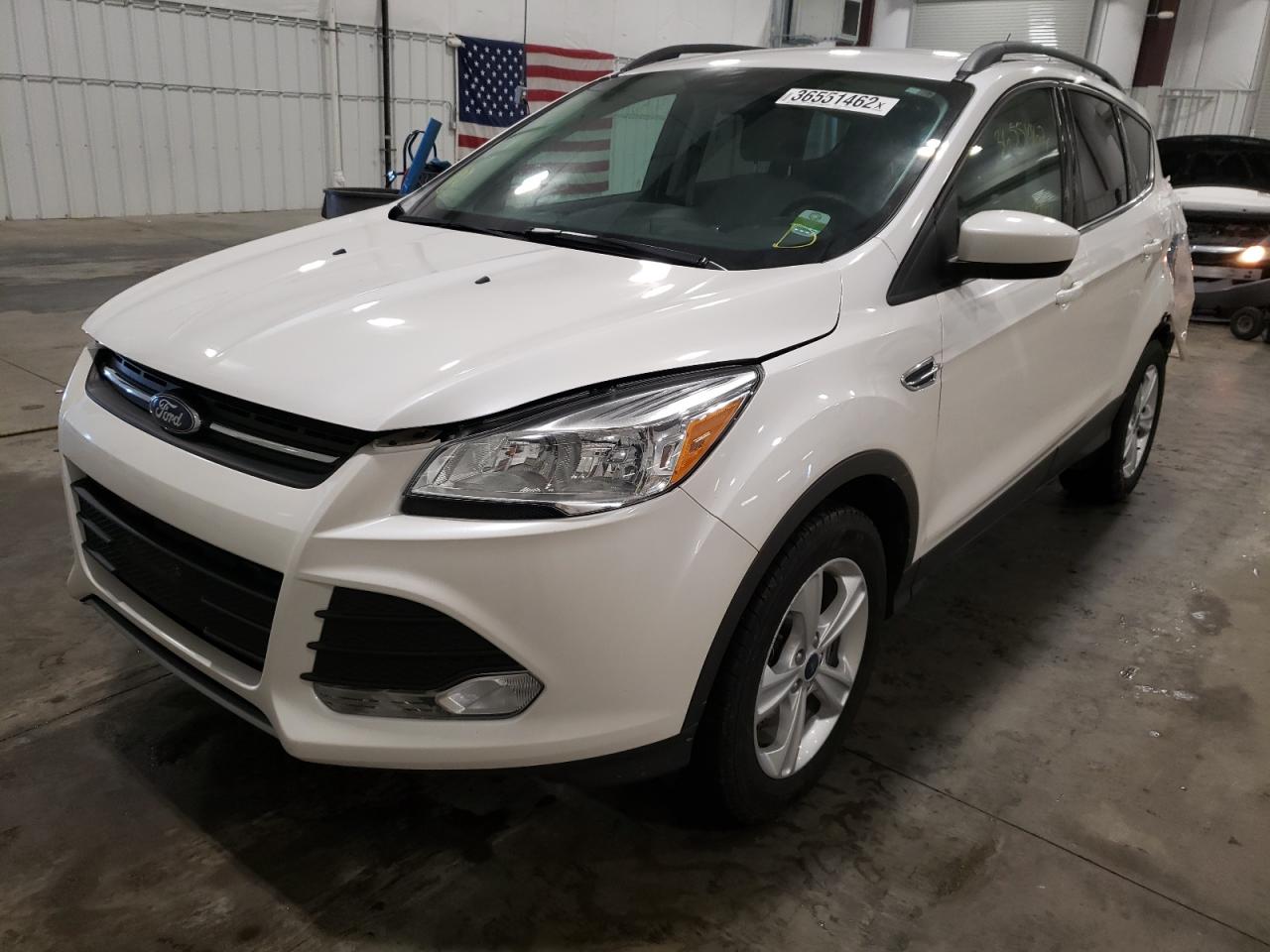 Photo 2 from auction – 2016 FORD ESCAPE SE with VIN 1FMCU9G98GUA53361