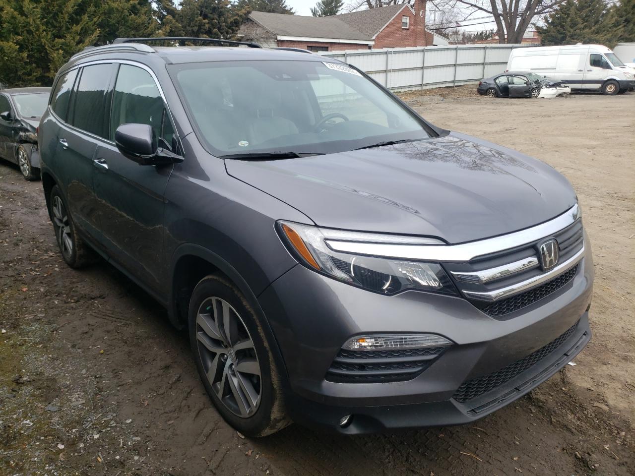 Photo 9 from auction – 2018 HONDA PILOT ELIT with VIN 5FNYF6H04JB053599