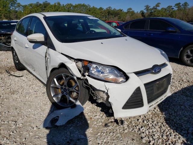 FORD FOCUS SE 2014 with VIN 1FADP3K23EL320941 - Photo from auction