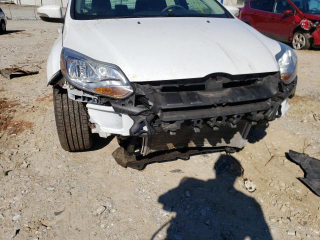 Photo 9 from auction – 2014 FORD FOCUS SE with VIN 1FADP3F23EL159789