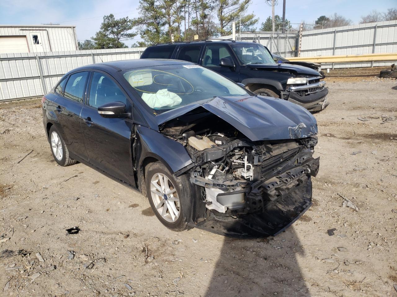 FORD FOCUS SE 2017 with VIN 1FADP3F21HL201705 - Photo from auction