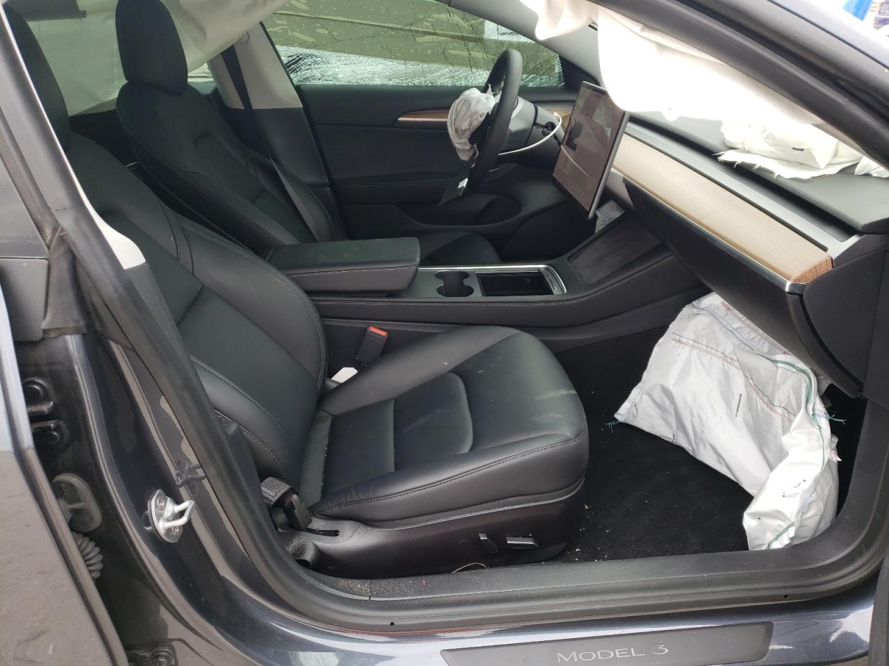 Photo 5 from auction – 2021 TESLA MODEL 3 with VIN 5YJ3E1EAXMF014579
