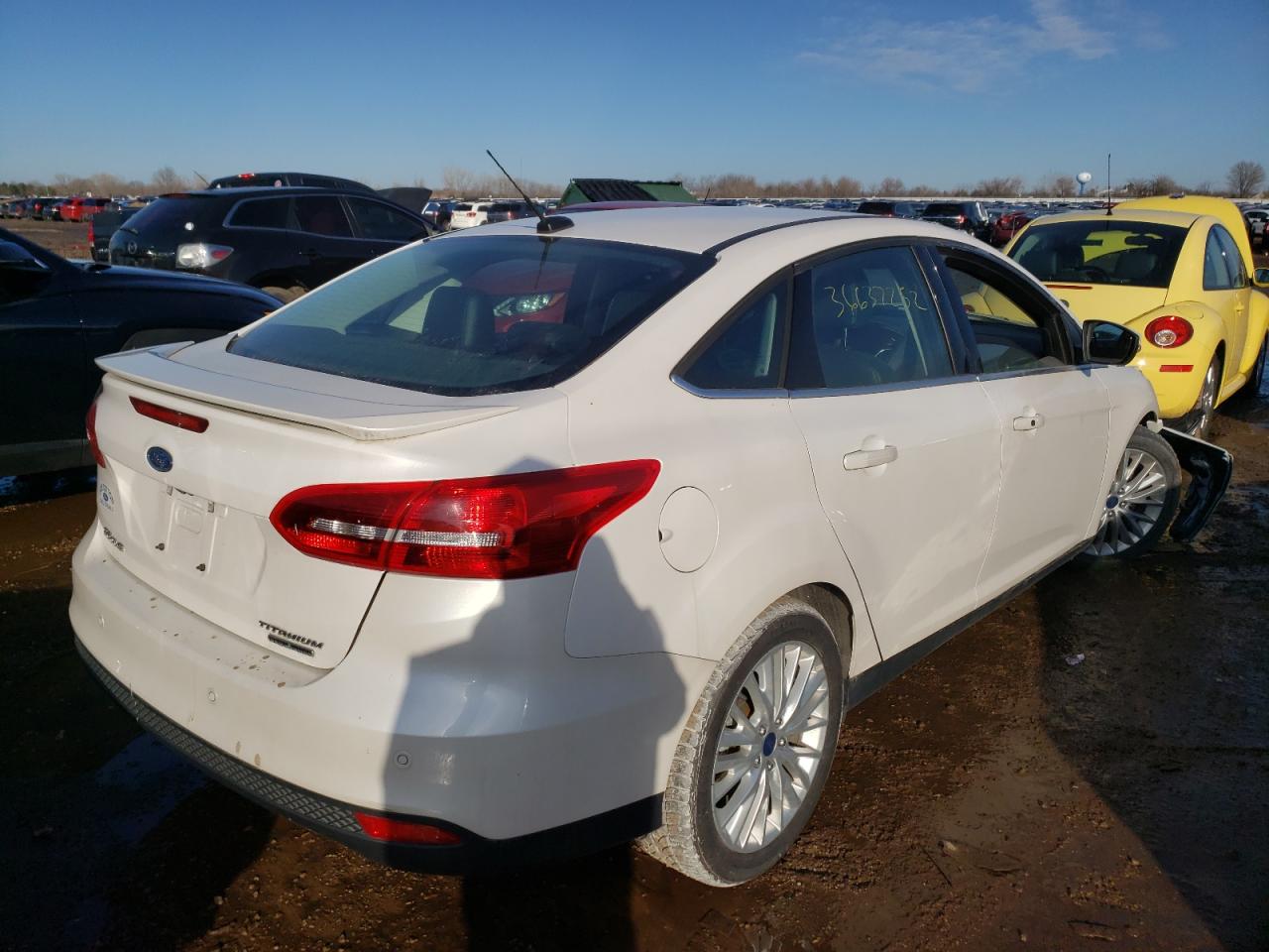 Photo 4 from auction – 2016 FORD FOCUS TITA with VIN 1FADP3J26GL237184