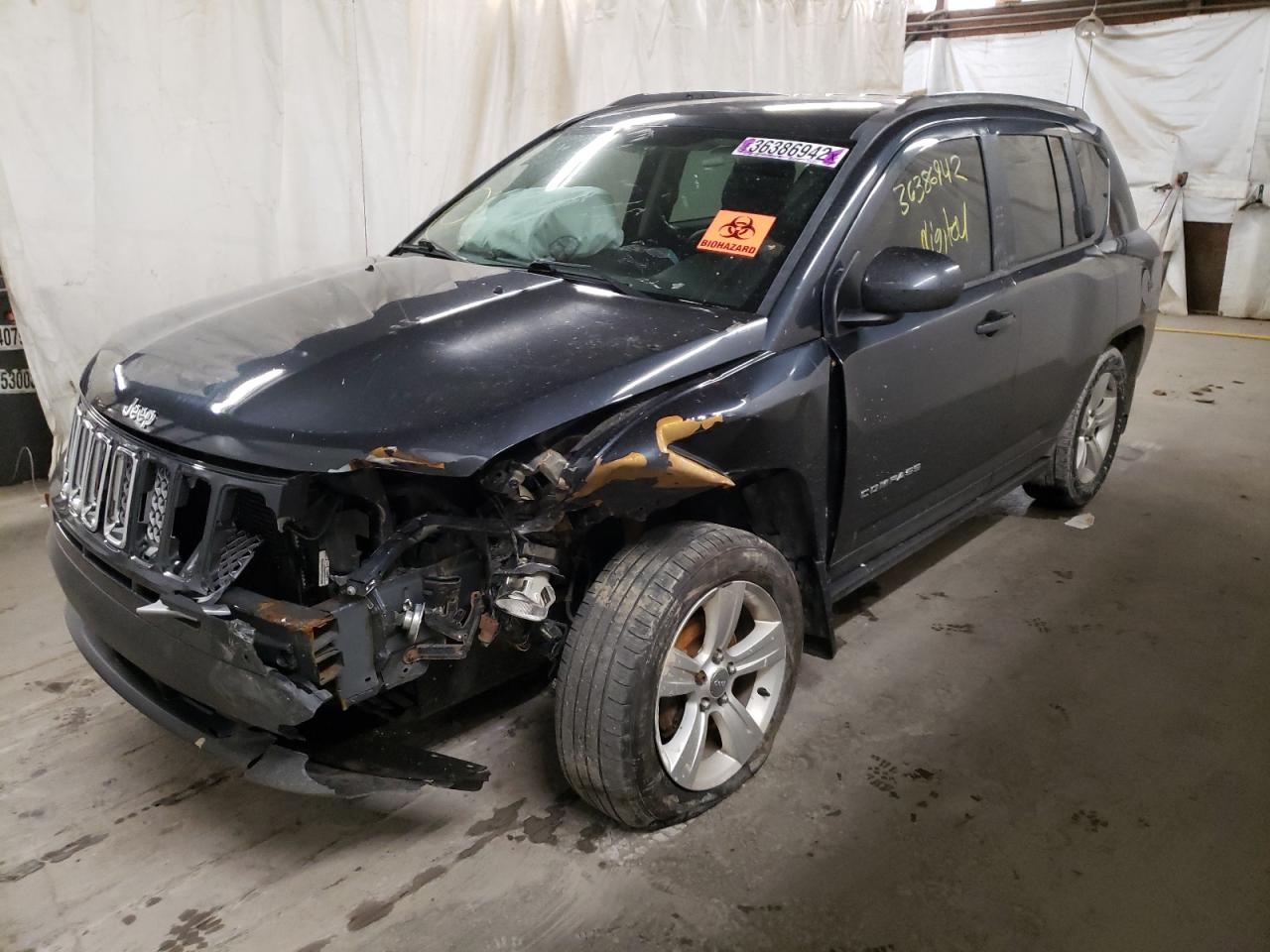 Photo 2 from auction – 2014 JEEP COMPASS LA with VIN 1C4NJDEB0ED852126