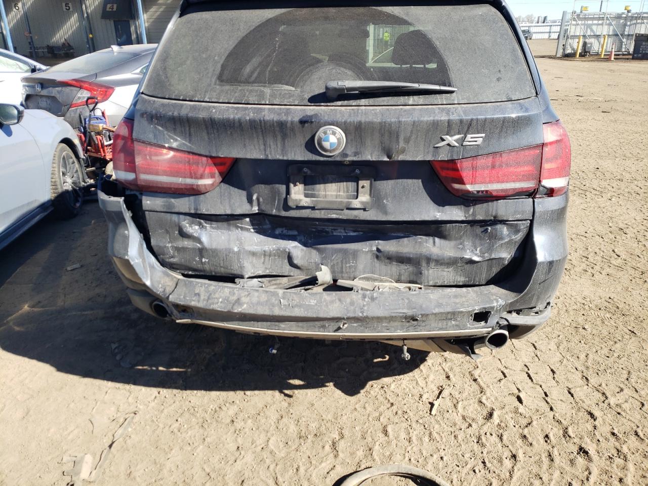 Photo 9 from auction – 2014 BMW X5 XDRIVE3 with VIN 5UXKR0C55E0K46134