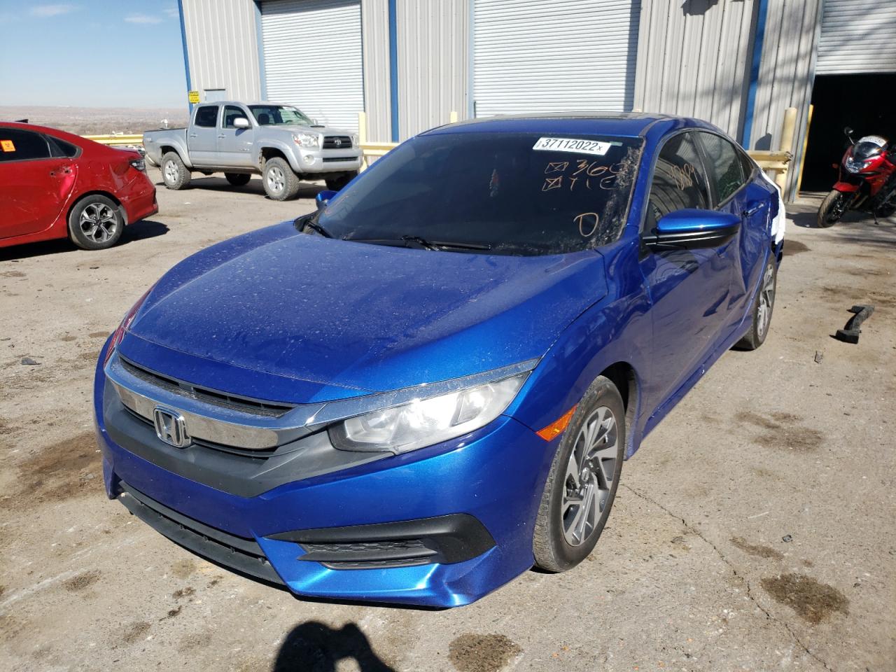 Photo 2 from auction – 2018 HONDA CIVIC EX with VIN 19XFC2F79JE020256