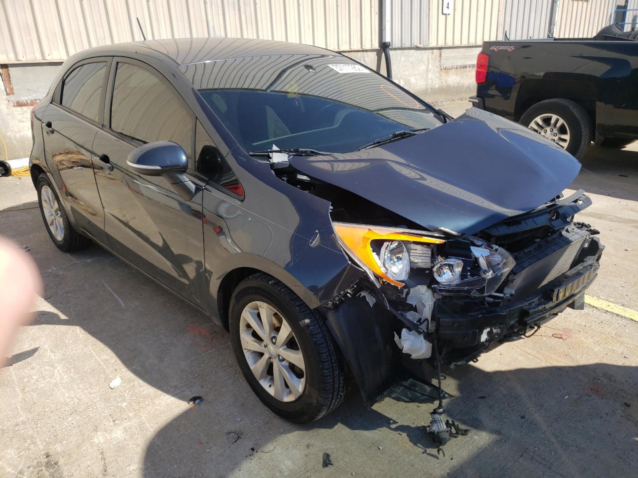 KIA RIO EX 2013 with VIN KNADN5A31D6124108 - Photo from auction