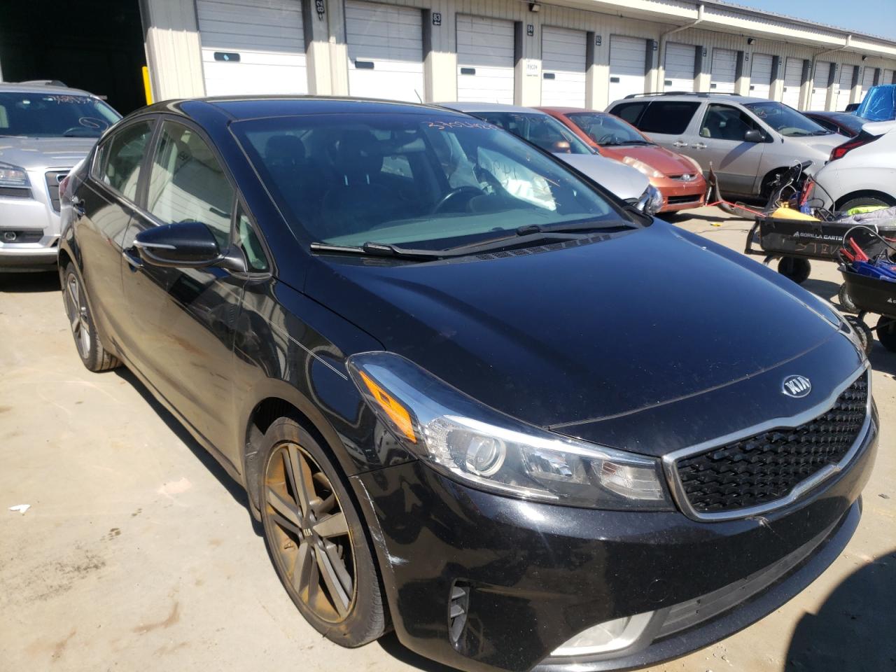 KIA FORTE EX 2017 with VIN 3KPFL4A86HE087628 - Photo from auction